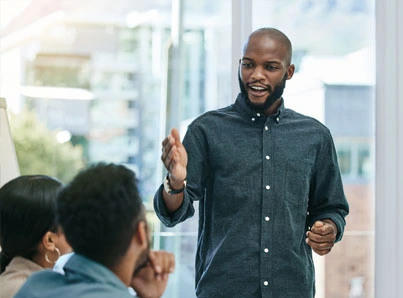 Young business man leading a group