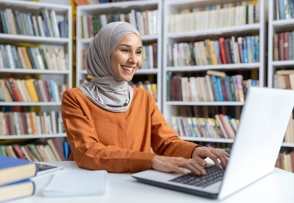 Muslim student on laptop