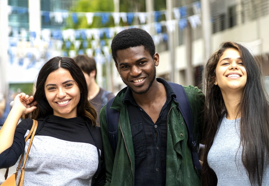 3 people smiling