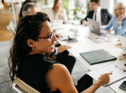 female business woman smiling in meeting
