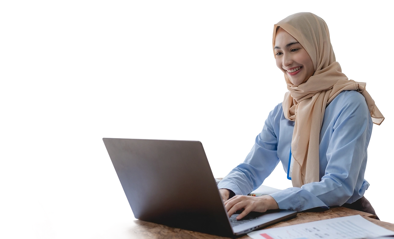 female student with hijab on laptop
